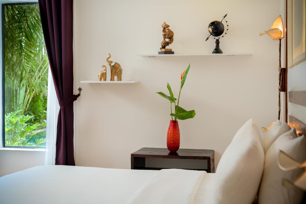 The Thirdfold Residence Siem Reap Eksteriør billede A bedroom at the hotel